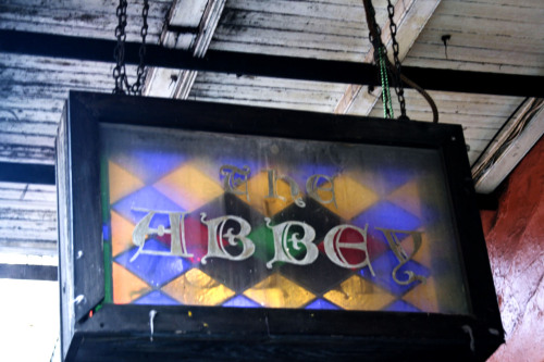 20 Must-Try Foods and Activities in New Orleans 24 The sign for "The Abbey" prominently displayed above the entrance to the bar.