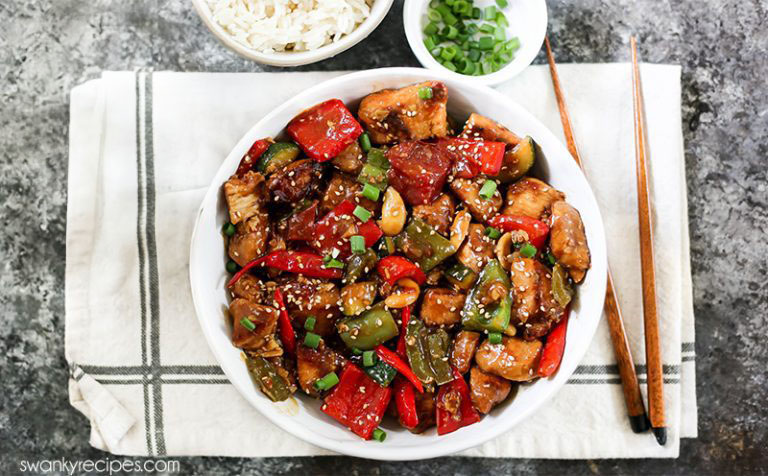 Kung Pao Chicken is a Chinese classic made with chicken breasts, chili peppers and fresh vegetables in a spicy sweet sauce with nuts. Serve with cooked rice for a quick homemade Chinese dinner that will rival any takeout recipe.
