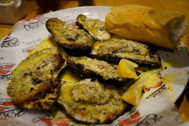 20 Must-Try Foods and Activities in New Orleans 1 half dozen chargrilled oysters from dragos.